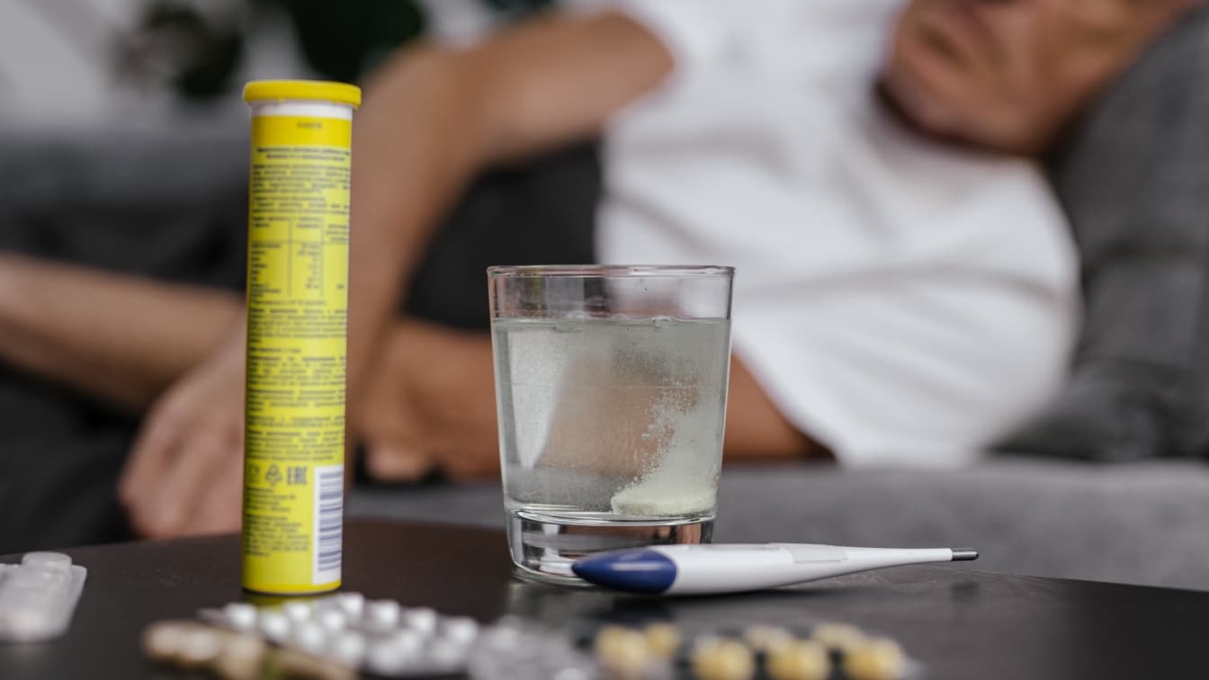 Vitamins In Front Of Sick Man